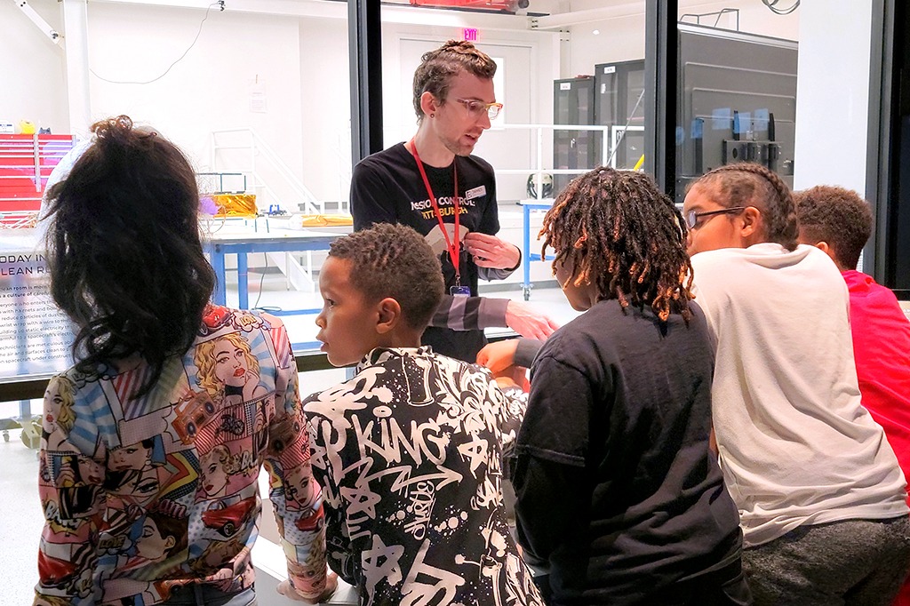 Middle school students on a tour.