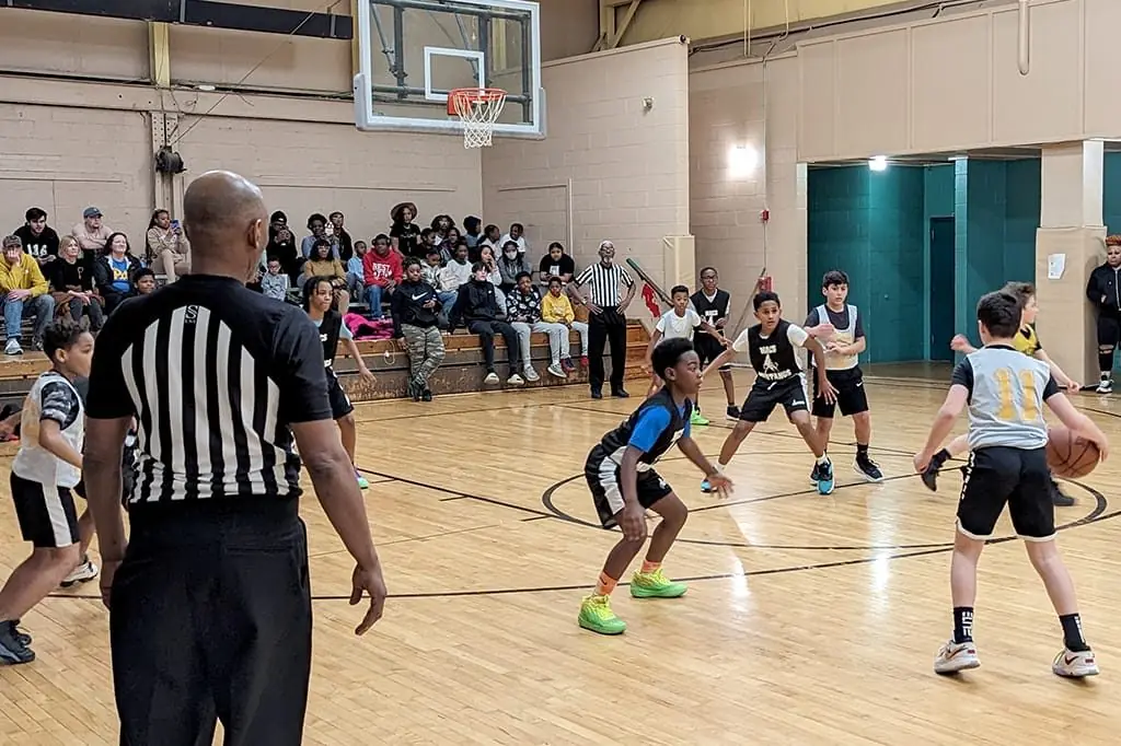 MACS Elementary basketball game in a crowded gym.