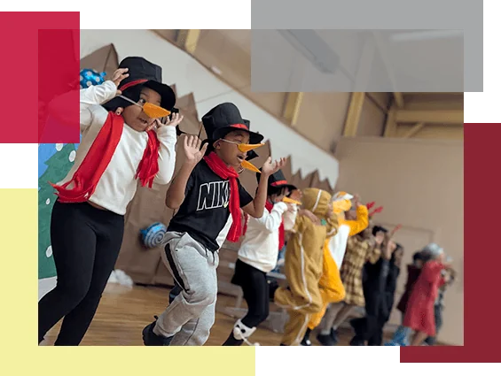 A group of students dance during a winter performance.