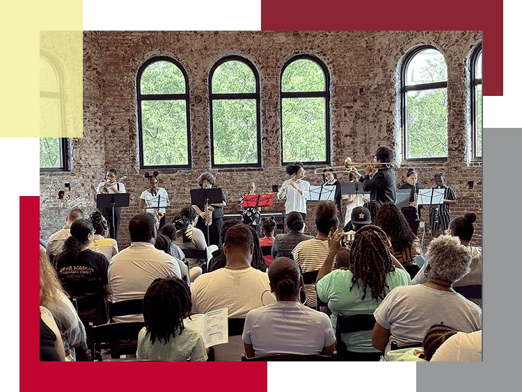 The MACS Orchestra performs.